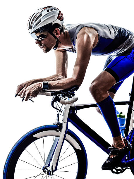 istock man triathlon iron man athlete cyclist bicycling 500281393