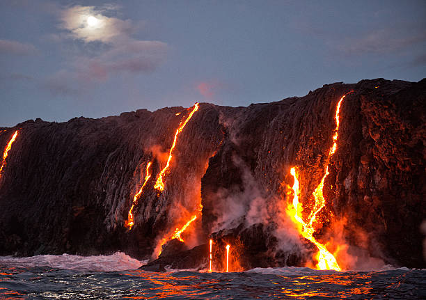 Kilauea Volcano Lava Lava from Kilauea volcano entering ocean, Big Island, HI volcano stock pictures, royalty-free photos & images