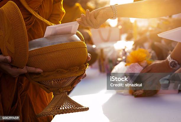 Monk Receiving Food And Items Offering From People Stock Photo - Download Image Now - Monk - Religious Occupation, Buddhism, Currency