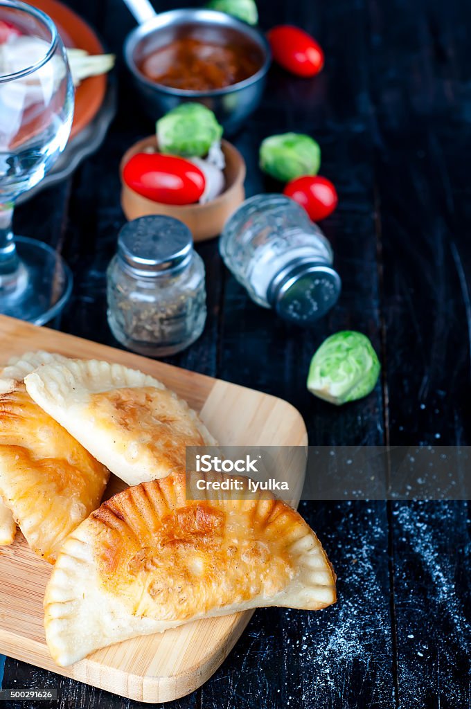 Fresh baked  pasties Fresh baked  pasties filled with meat and vegetables 2015 Stock Photo