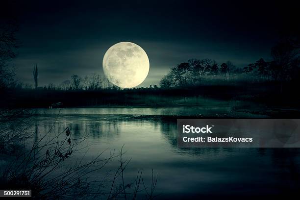Spooky Moonrise Over Lake Stock Photo - Download Image Now - Moon, Planetary Moon, Lake
