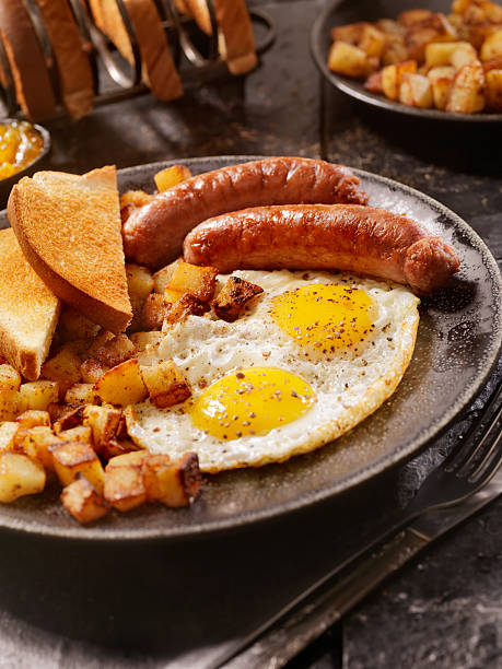 istock Breakfast with Sunny side up eggs and Sausage 500292882