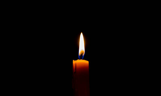 istock Yellow candle on the dark background 500293377
