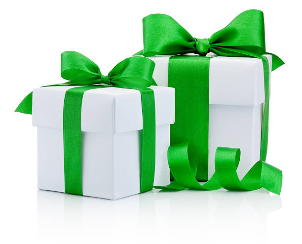istock Two gift boxs tied green ribbon bow Isolated on white 500293740