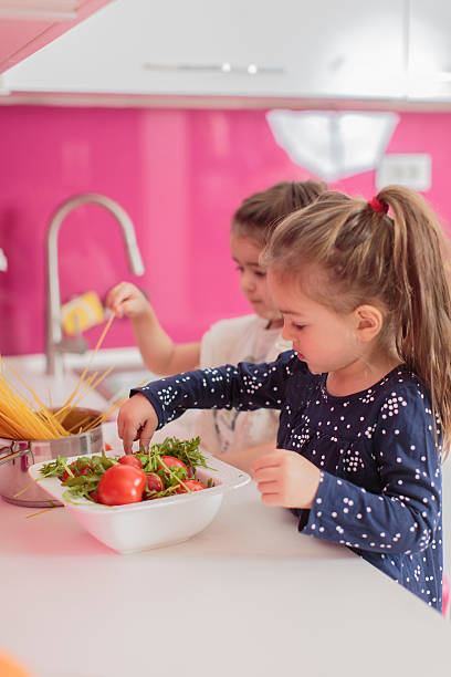 istock Little girls in the kitchen 500294537