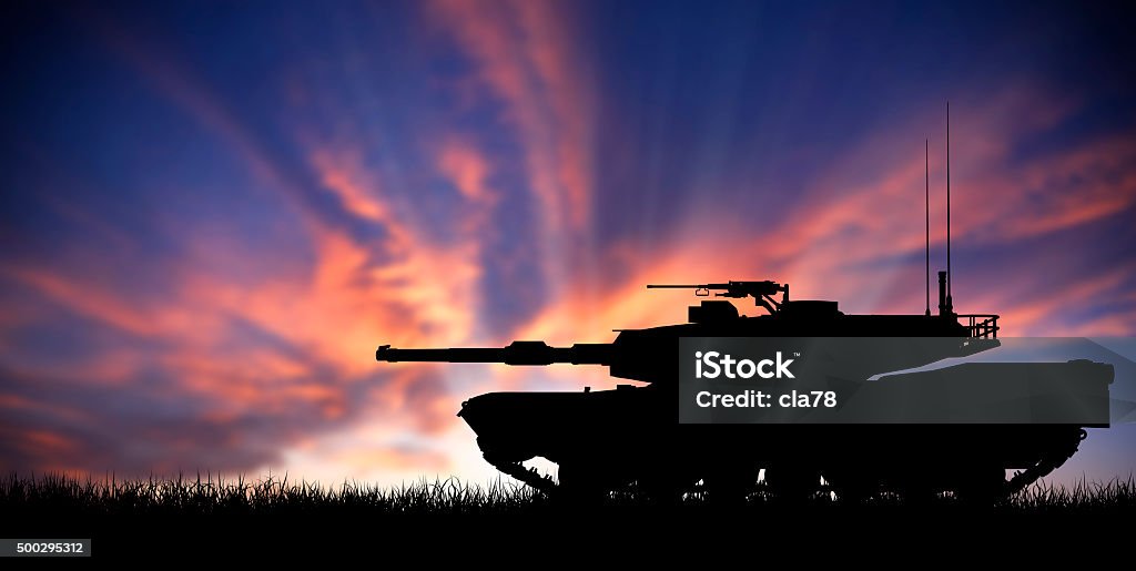 Modern heavy tank at sunset Modern heavy tank isolated in front a sunset Armored Tank Stock Photo