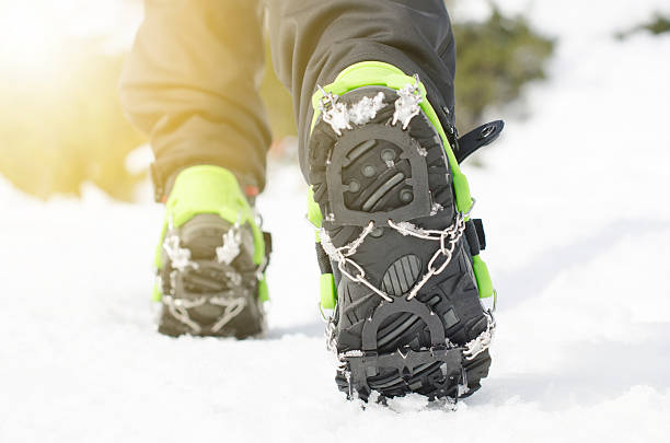 istock Hiking boots with equipment for ice. Snow like a background 500296088
