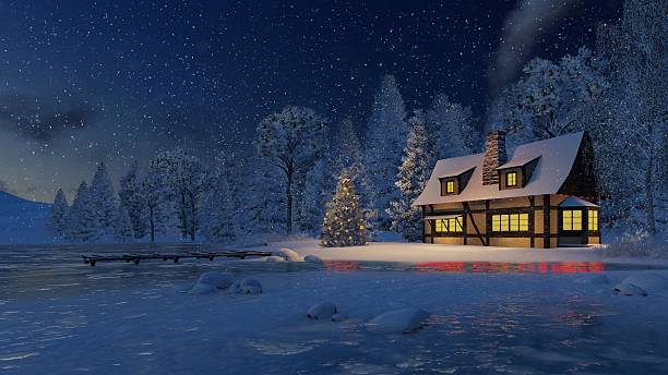 istock Illuminated house and Xmas tree at snowfall night 500296340