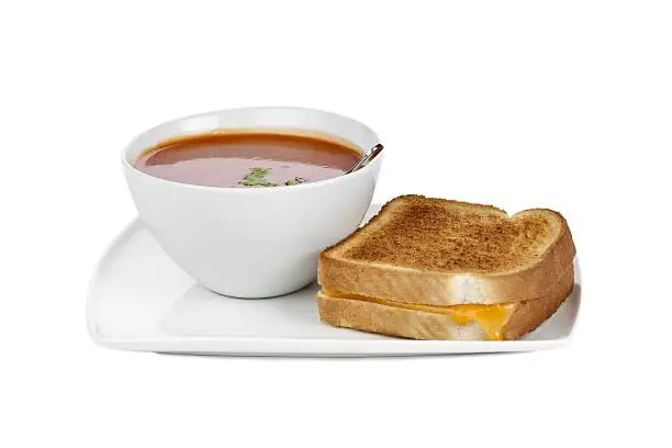 Photo of egg sandwich and tomato soup
