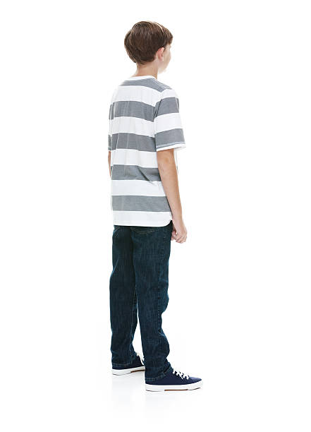 istock Rear view of boy standing and looking away 500297066