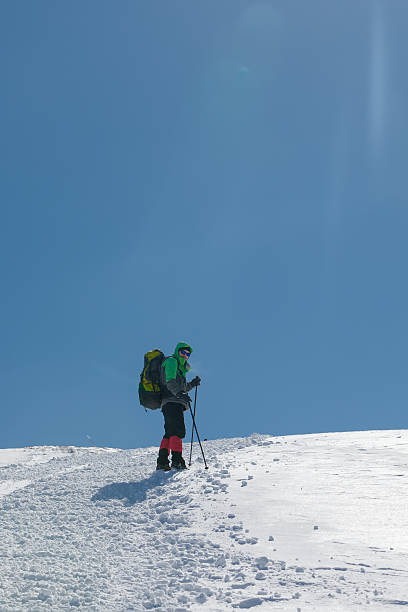 istock Hiker in winter mountains on sunny day 500297688