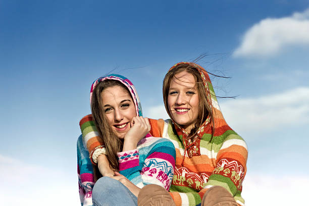 istock Two beautiful teens enjoy outdoor 500298012