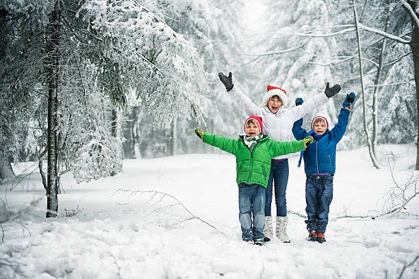 istock Kids enjoying snow and christmas 500301540