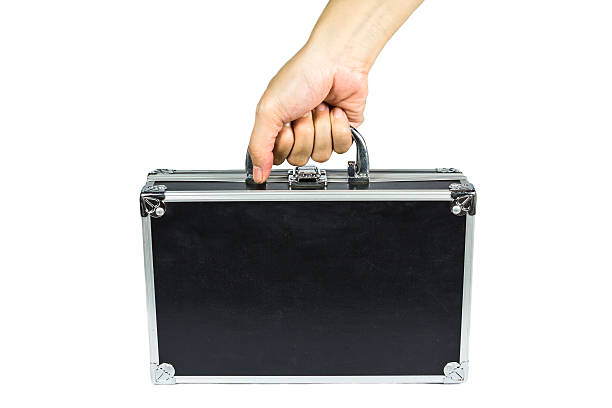istock Hand and arm holding briefcase isolated on white background 500302663