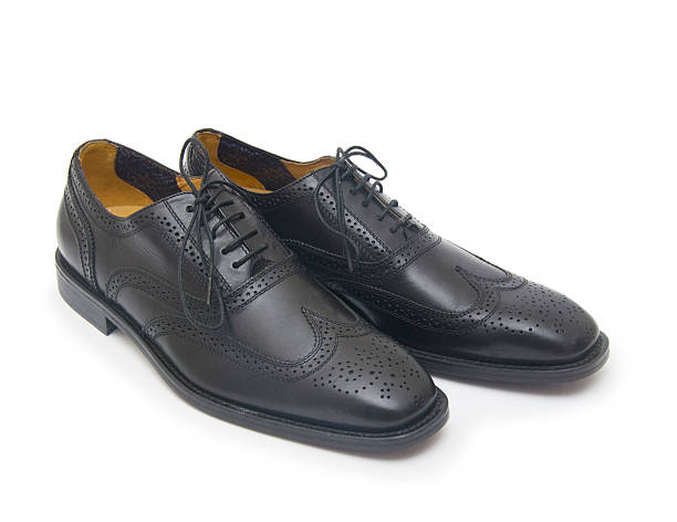 istock The black man's shoes isolated on white background. 500303079