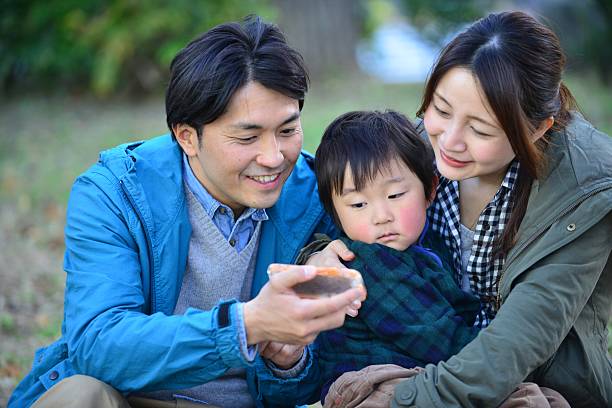 istock Young Japanese Couple with a son 500303401