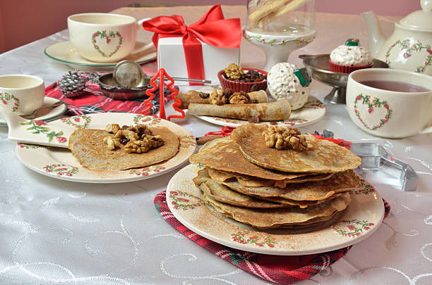 istock Sweet pancakes on Christmas crockery 500303876