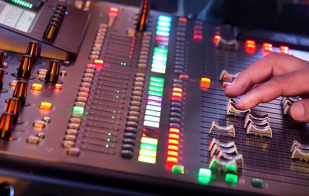 istock Adjust sound mixer switch in concert 500304211