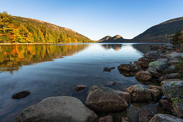 istock Mountain Lake in Early Autumn Sunlight 500304720