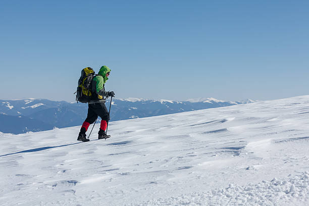 istock Hiker in winter mountains on sunny day 500305010
