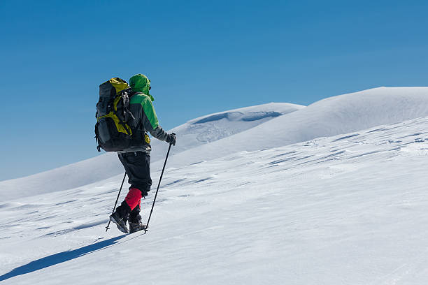 istock Hiker in winter mountains on sunny day 500305026