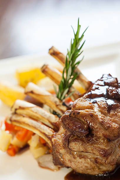 istock Delicious rack of lamb dish with rosemary sprig 500308101