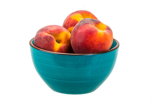 istock Peaches in the bowl 500319081