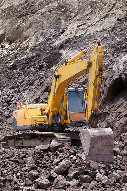 istock Excavator in the rock mine 500319647