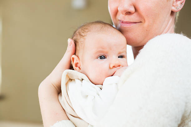 istock Newly born baby with her mother 500321764