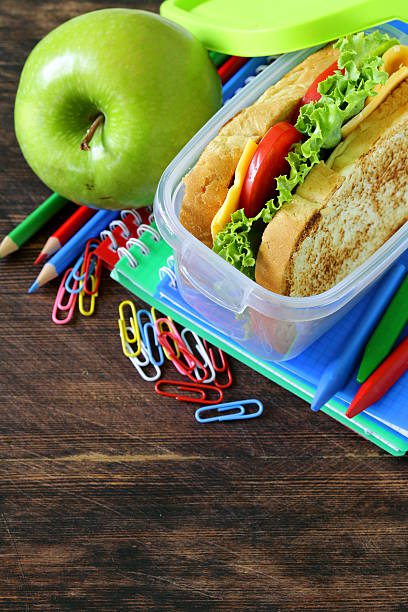 istock sandwich and green apple for a healthy school lunch 500324439