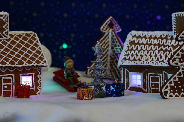 istock Christmas card with gingerbread house and tree 500328860