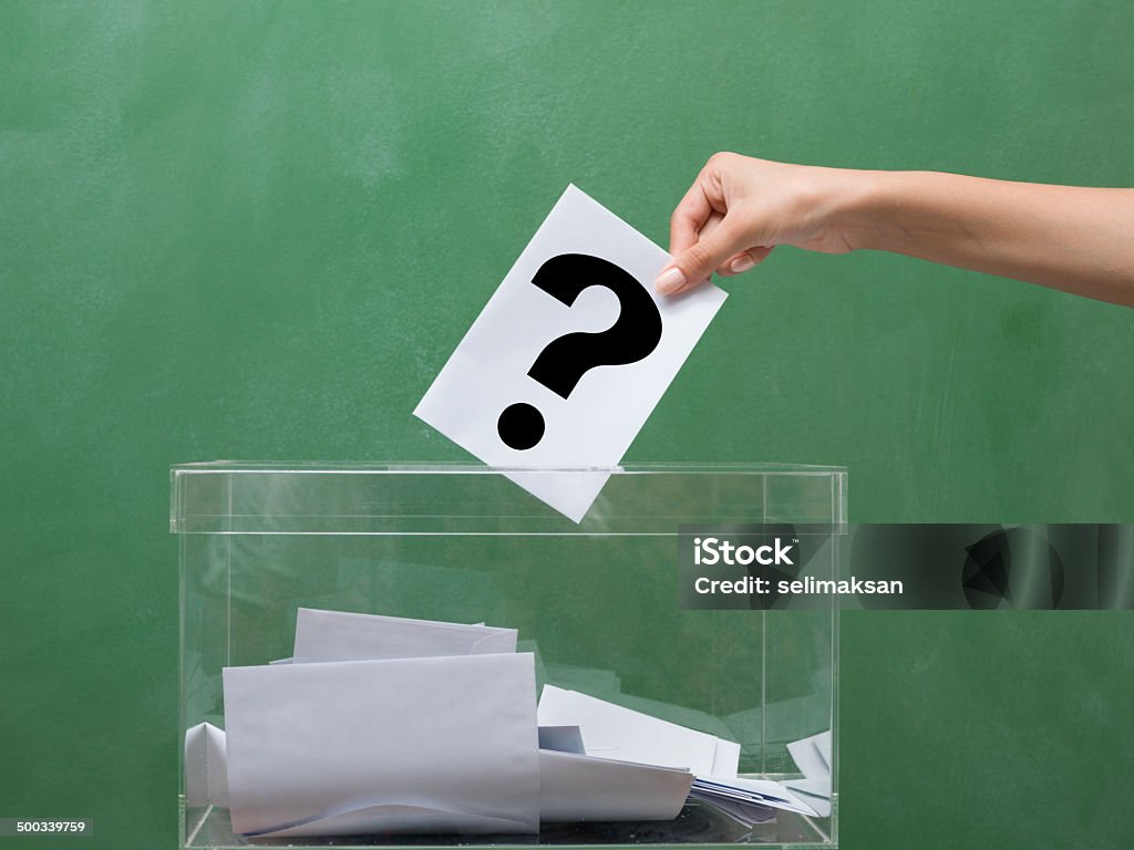 Voting for election, transparent ballot box Voting for election in front of black blackboard Voting Ballot Stock Photo