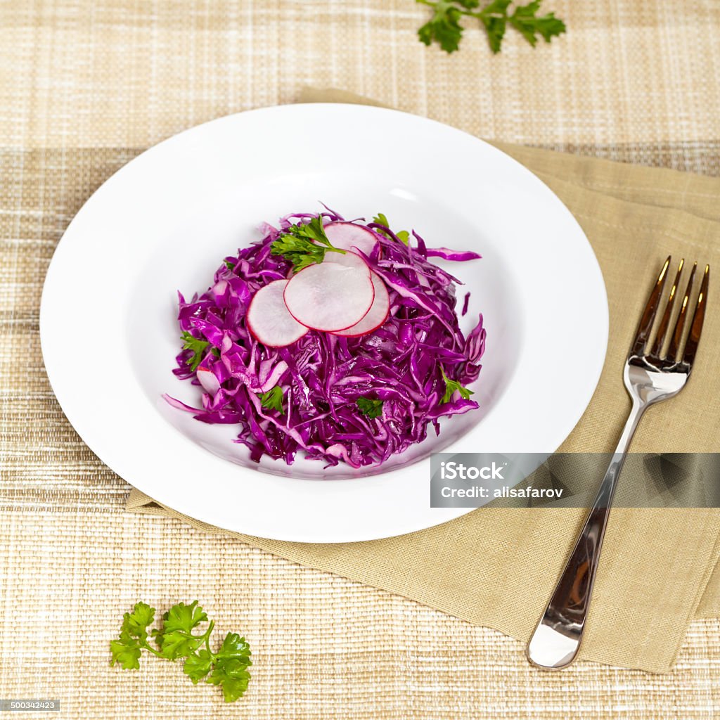 Red Cabbage Salad Red cabbage salad with Radish and Parsley Appetizer Stock Photo