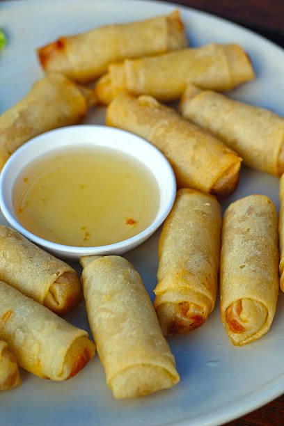 istock Food fried spring rolls with dipping sauce. 500343925