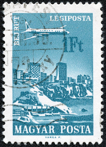 Plane over Beirut,Hungary stamp HUNGARY - CIRCA 1966   A stamp printed in Hungary shows Plane over Beirut, with the inscription  Beirut , from the series  Plane over Cities served by Hungarian Airways , circa 1966 lebanon beirut stock pictures, royalty-free photos & images