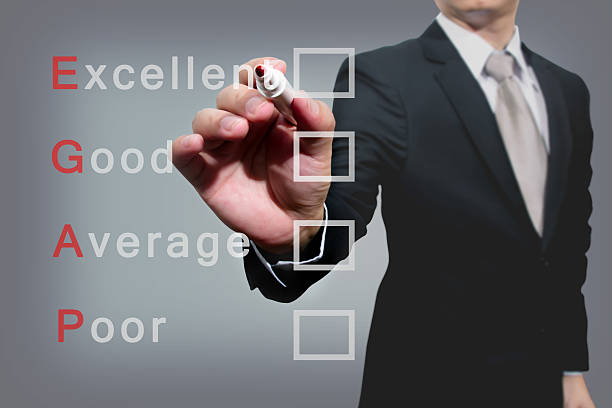 istock Young business hand with pen mark the check boxes. 500346543