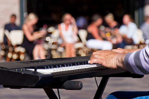 street musician - street musician stock-fotos und bilder