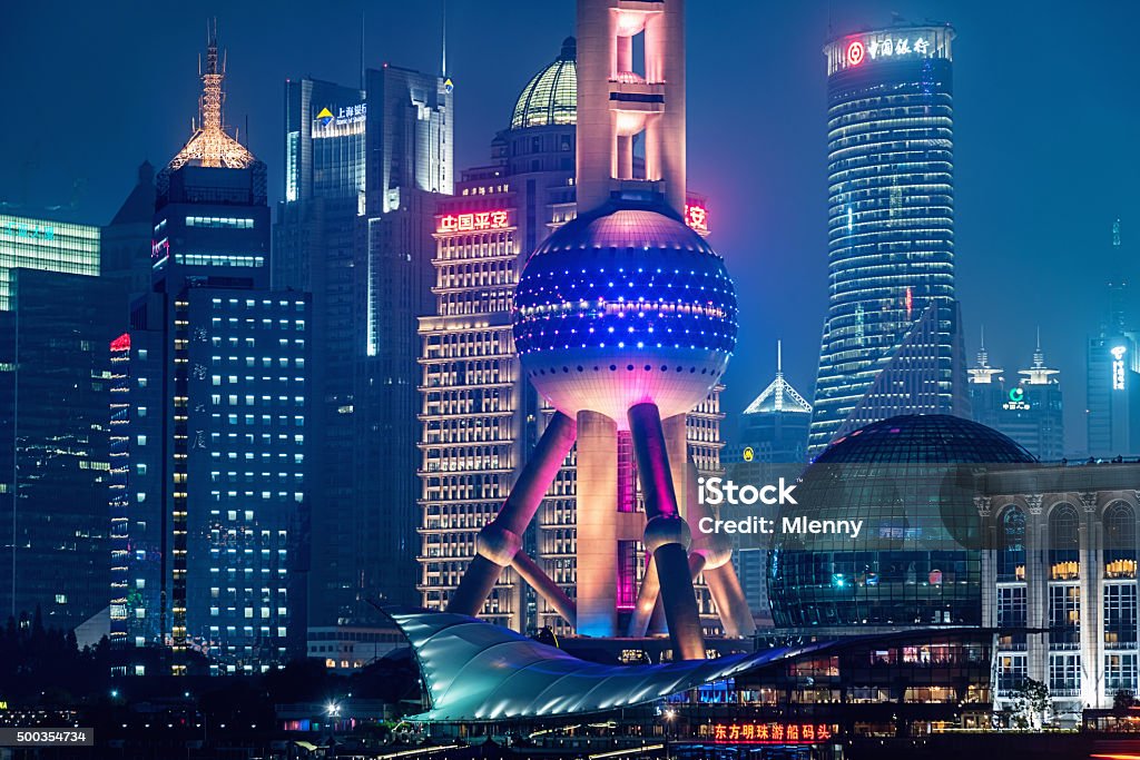 Futuristic Shanghai City China Futuristic illuminated Pudong Skyline Skyscapers in Shanghai with Oriental Pearl Tower, Shanghai, China. Shanghai Stock Photo
