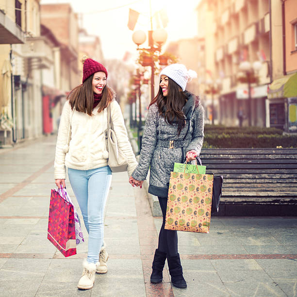 istock Two beautiful women in shopping 500355938