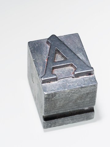 letter A metallic letterpress type block isolated on white