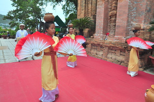 Nha Trang, Vietnam - July 11, 2015: Performing of a traditional folk dance of champa at the Ponagar temple in Nha Trang