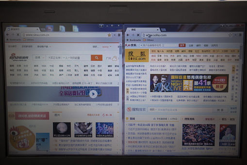 Guangzhou, China - November 11, 2013: With Electronic Business developing rapidly, most people visiting Chinese online portal websites demonstrated on computer screen. Today  top 2 Chinese portal websites are sina and sohu.