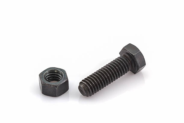 istock Closeup metal screw, bolt and metal nuts. 500357990