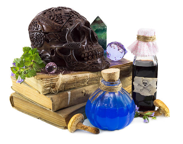 istock Skull with books and elixirs 500359319