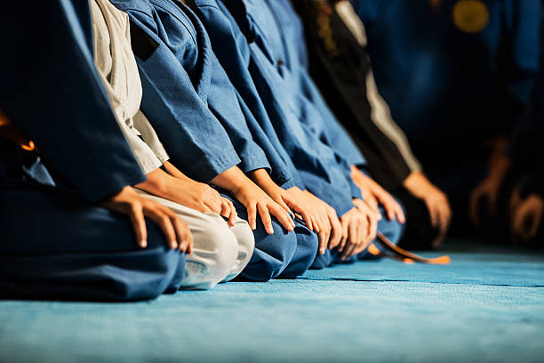 Martial arts. Unrecognizable group of children in a row on a karate training.    judo photos stock pictures, royalty-free photos & images