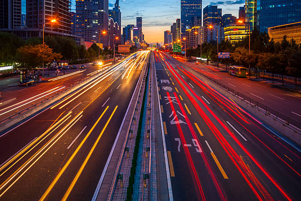 istock Urban highway traffic at night 500360285