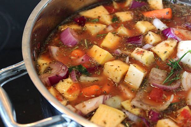 istock Chicken stew / vegetable casserole cooking in saucepan / pan, vegetable soup 500360431