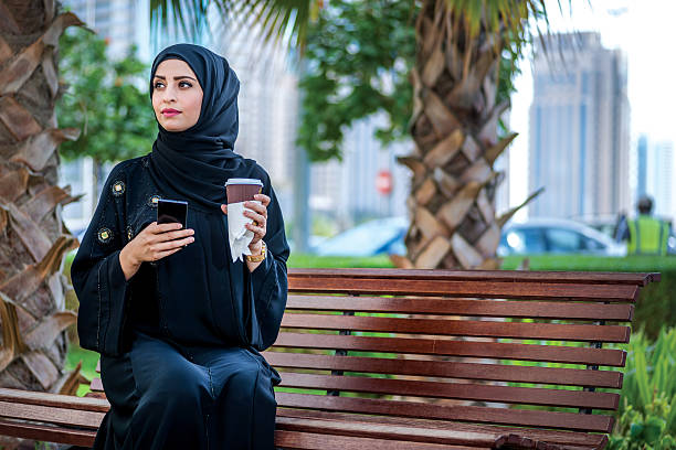 istock Arab businessman holding a coffee wearing the hijab 500361162