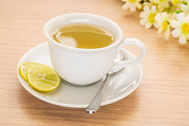 istock Cup of tea with lemon on table 500361469