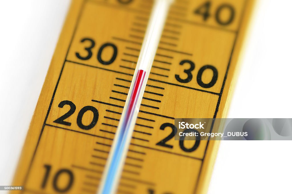 Heat wave for wood thermometer Wood thermometer on white background, in degree Celsius, show a heat wave, the temperature rise up to 30 degree celsius. It's getting hot from the 25 degree. Heat - Temperature Stock Photo